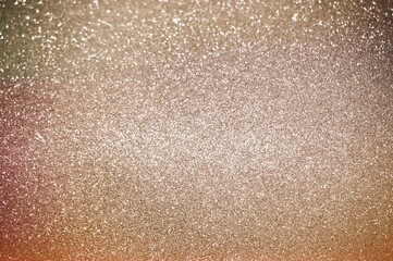 Abstract of shining bokeh glitters for background with copy space. Christmas and New Year wallpaper decorations concept