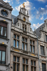 Fototapeta na wymiar Facades of medieval houses with tiled roofs in the center of Antwerp, Belgium