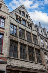 Fototapeta premium Facades of medieval houses with tiled roofs in the center of Antwerp, Belgium
