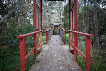 Fototapeta na wymiar Red timber bridge