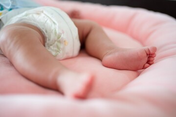 Soft focus of baby Newborn baby showing a little foot