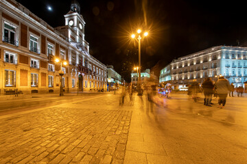 Fototapeta na wymiar Puerta del sol square in Madrid, Spain illuminated at night