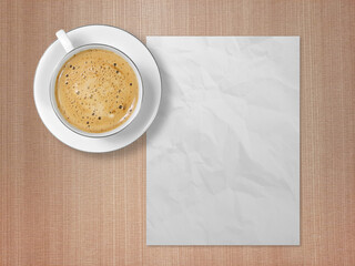 Crumpled white paper with coffee cup on brown wood table