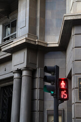 A Stop Sign Indicated by the Red Light to Let the People Know to Stop For A While From Using the Zebra Cross