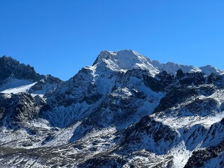 Fototapeta premium Alpine rocky mountain peak Piz Grialetsch (3130 m) in the massif of the Albula Alps above the Vardet da Grialetsch glacier, Zernez - Canton of Grisons, Switzerland (Kanton Graubünden, Schweiz)