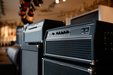 Audio sound amplifier equipment assortment at music shop showcase