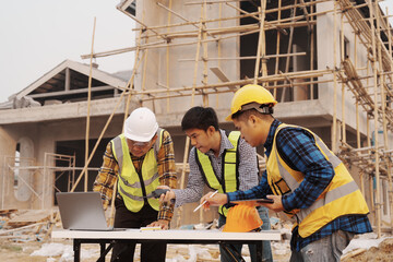 Team of engineer and worker checking construction site outdoors Surveyor builder Engineer surveying...