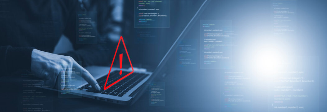 notification error and maintenance with triangle caution warning sign for notification error, Programmer using laptop with triangle caution warning sign, hacker attacks , cyber crime, cyber security