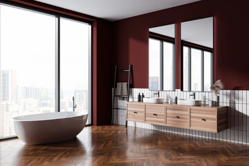 Stylish bathroom interior with double sink and tub, accessories and window