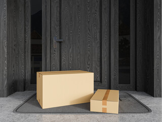 Cardboard boxes left near black door