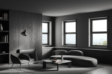 Grey living room interior with armchair and couch with decor near window