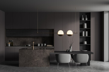 Dark gray kitchen with cabinets and island