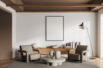 White living room with armchairs and poster