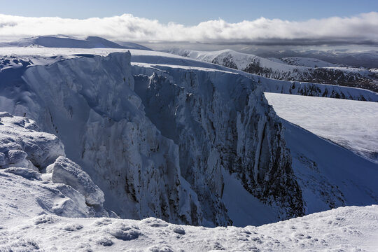 Snow-covered cliffs on mountain top