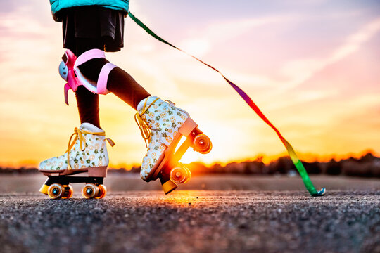 Child enjoying an evening ride on her rollerskates