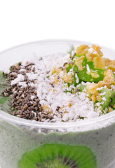 Smoothie with kiwi, coconut, granola and chia seeds