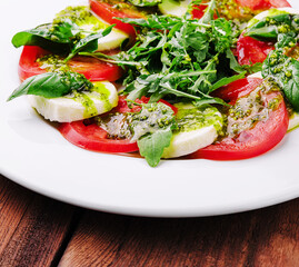 Traditional italian caprice salad tomato, mozzarella cheese and basil