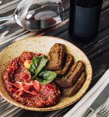 Snack salad of roasted eggplant with garlic and tomato