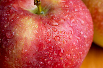 Fresh red and green apples on the kitchen table