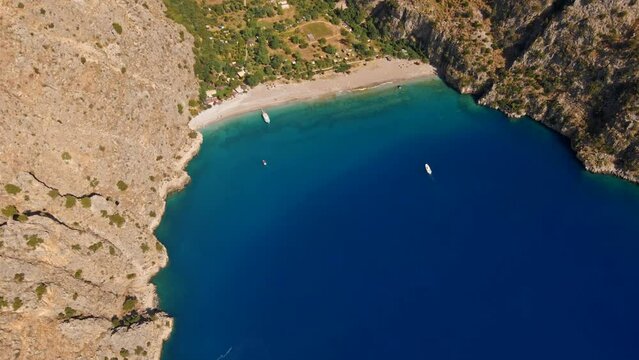 Butterfly Valley is a valley in Fethiye district of Mula Province, southwestern Turkey, which is home to diverse butterfly species.