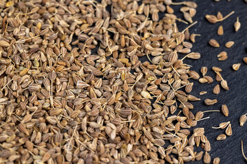 Small, fragrant anise spices on the board