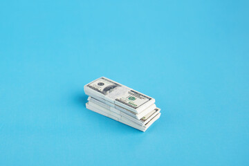 dollar pack, american dollars banknotes cash on a blue background