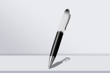 Classic office pen flying on background