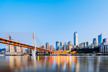 Fototapeta premium Night scenery of Hongya Cave and Qiansimen Bridge in Chongqing, China