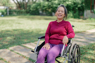 Fototapeta na wymiar Happy senior woman smiling sitting on wheelchair, happy mental health..