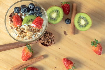 Homemade baked granola berry fruit yogurt