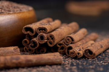 solid aromatic cinnamon on the table in chocolate