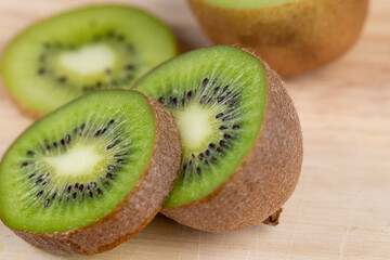 fresh green kiwi while cooking food in the kitchen