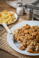 Barley groats with stewed meat.
