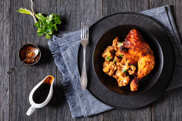 baked chicken leg with spicy roast cauliflower