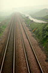 Fototapeta premium Railway structure in a misty day