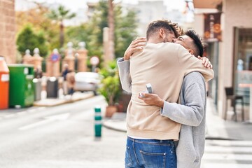 Young couple smiling confident surprise with egagement ring at street