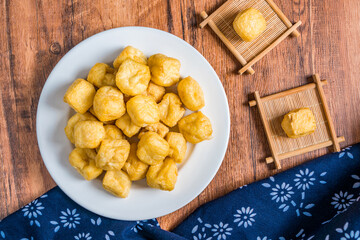 Chinese traditional food a plate of oil bean puff