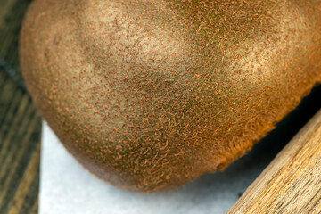 Whole ripe kiwi on the table