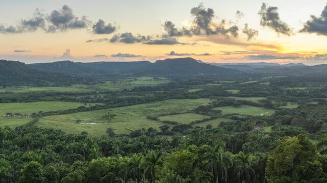 Bird's eye view of fields and forests during a sunset in Cuba