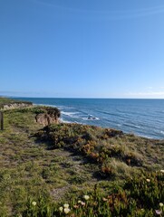 view of the coastal cliffs over the Pacific Ocean in Half Moon Bay, California