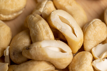 scattered pile of cashew nuts