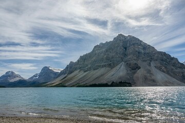 Scenic view of a mountain seen by the shore of Bow Lake located in Canada