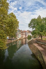 Fototapeta na wymiar Vertical shot of the Petite France region located in Strasbourg, France