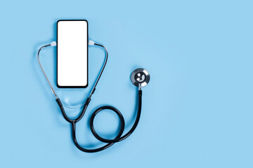 Fototapeta na wymiar Mobile phone mockup for medical app. Smartphone white screen mockup and stethoscope for health application.
