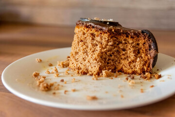 a eaten piece of cake on a plate
