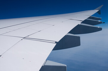 wing of Airbus A370 airplane in sky - 593217005