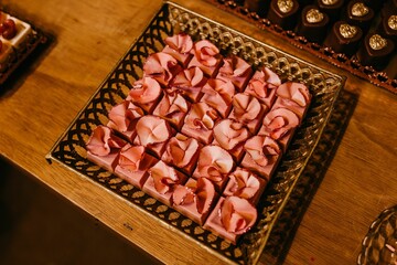 Wooden table with fresh tasty sweets