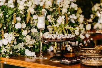 Beautiful wedding assortment of snacks on a wooden table in a restaurant