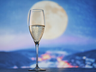 Champagne, moonlit cityscape, romantic ambiance