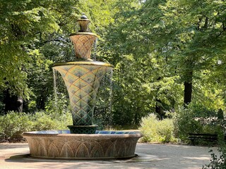 Beautiful fountain in a green park in Dresden
